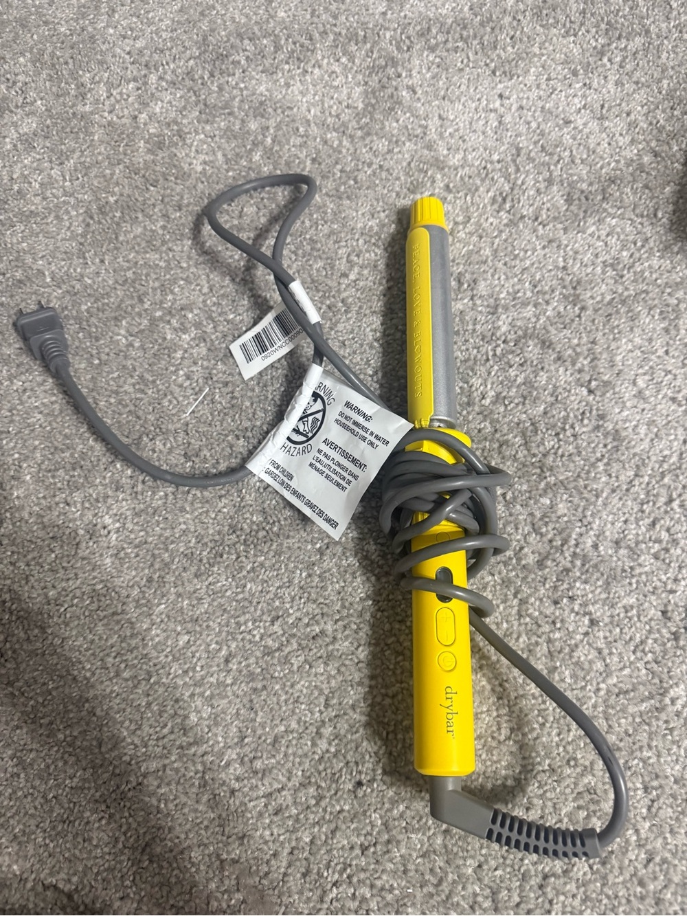 Small yellow hair styling tool